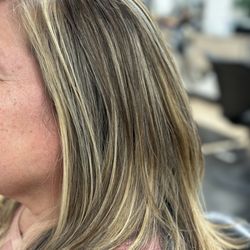 He and She Hair Salon - Highlights on her natural base color.