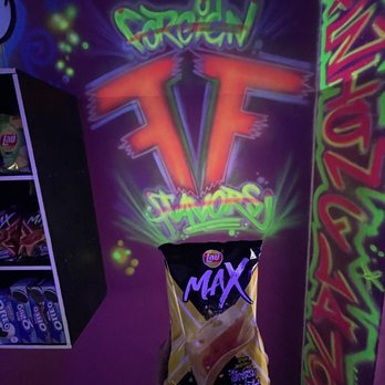 Foreign Flavorz - a hand holding a bag of snacks - Candy Stores Near Me - Freeport, New York Foreign Flavorz - a hand holding a bag of snacks - Candy Stores Near Me - Freeport, New York