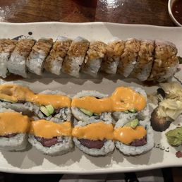 Spicy tuna roll (bottom) Shrimp tempura roll (top) Spicy tuna roll (bottom) Shrimp tempura roll (top)