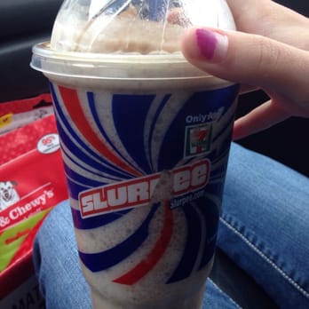7-Eleven - a hand holding a cup of coffee - Convenience Stores Near Me - Grover Beach, California