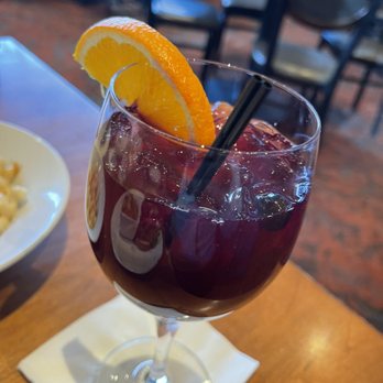 Bluestone Restaurant  - A vibrantly refreshing sangria with fresh fruit added to provide a fresh but subtle accent to a traditional cocktail. Red Sangria - American Near Me - Timonium, Maryland