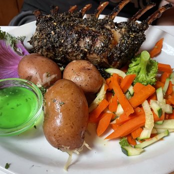 The Sow's Ear - New Zealand Rack of Lamb (marinated, herb crusted, chargrilled and baked, roasted red potatoes) - Cafes Near Me - Cambria, California