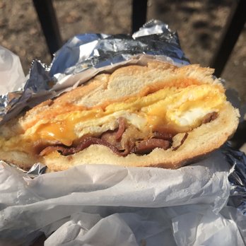 Mr Deli & Grill - Half of a protein Bacon Egg and Cheese Breakfast sandwich on a roll with cheddar. - American Near Me - Brooklyn, New York Mr Deli & Grill - Half of a protein Bacon Egg and Cheese Breakfast sandwich on a roll with cheddar. - American Near Me - Brooklyn, New York