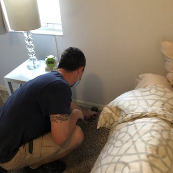 InSight Home Inspections - Dan scanning walls for moisture with his moisture meter - Home Inspectors Near Me