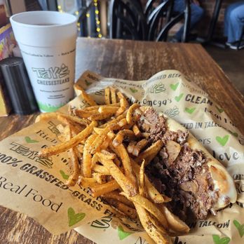 Tay’s Cheesesteak - Tay's 8" CheeseSteak, fries, Iced tea - Cheesesteaks Near Me - Kansas City, Missouri Tay’s Cheesesteak - Tay's 8" CheeseSteak, fries, Iced tea - Cheesesteaks Near Me - Kansas City, Missouri