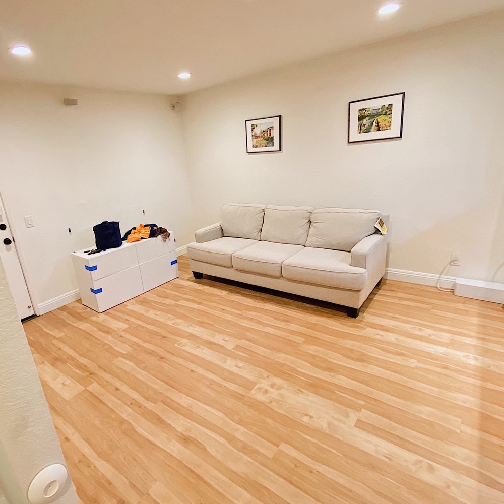 a living room and kitchen a living room and kitchen