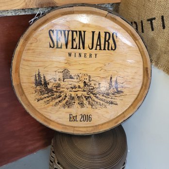 Seven Jars - a wooden barrel with a wine label on it - Wineries Near Me - Charlotte, North Carolina Seven Jars - a wooden barrel with a wine label on it - Wineries Near Me - Charlotte, North Carolina