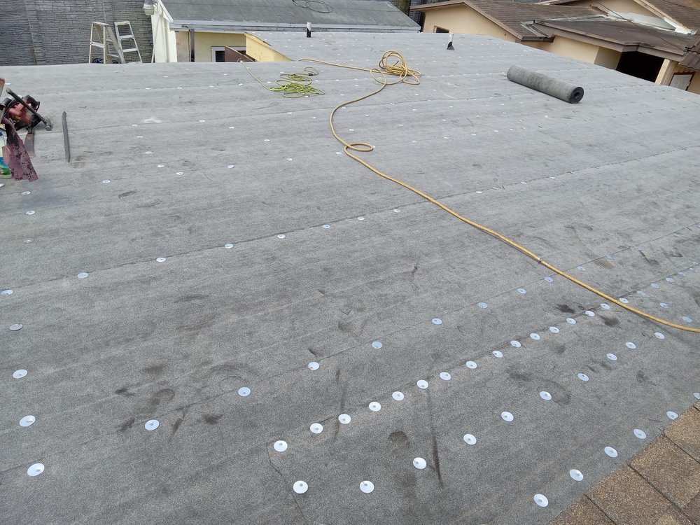 Slide of SGCI Roofing Division