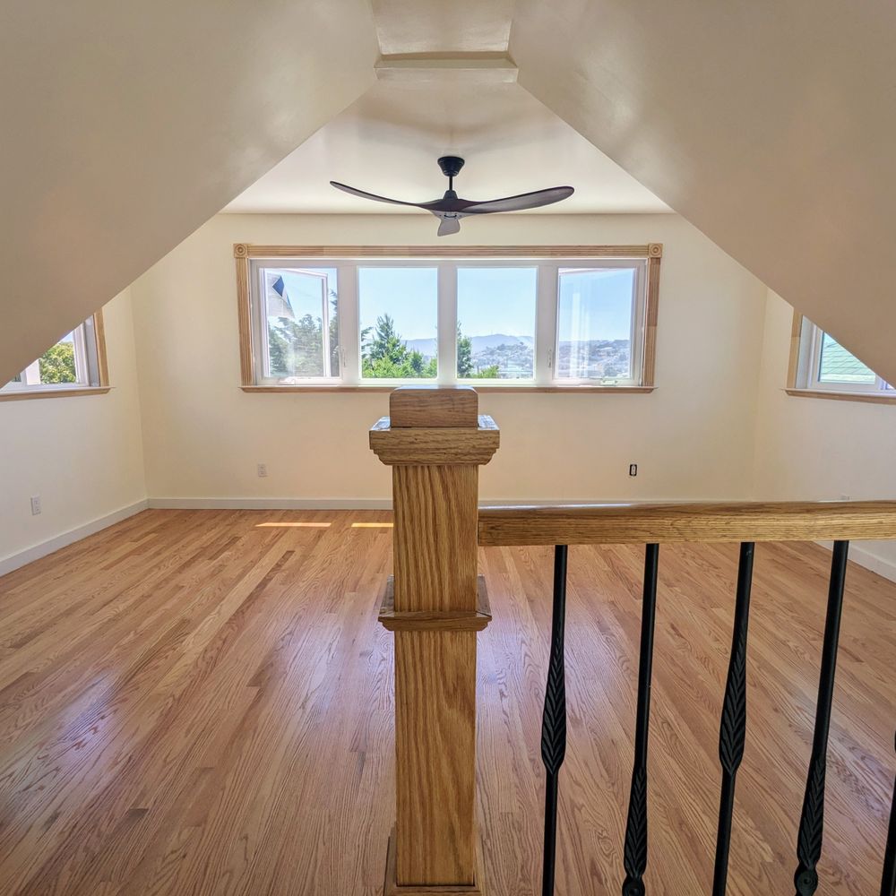 AYA Homes - Attic after - dormers, windows, fan, wood flooring - General Contractors Near Me - San Francisco, California AYA Homes - Attic after - dormers, windows, fan, wood flooring - General Contractors Near Me - San Francisco, California