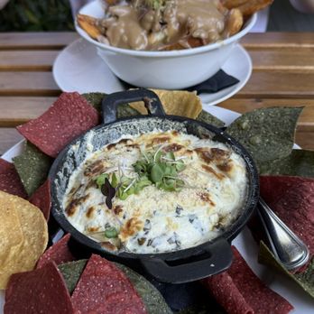 Stanley's Bar & Grill - artichoke dip and poutine - Bars Near Me - Vancouver, British Columbia Stanley's Bar & Grill - artichoke dip and poutine - Bars Near Me - Vancouver, British Columbia