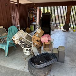 Junkyard Dogs Junk Removal - This customer needed junk removed from their carport and we were happy to help.