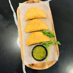 Franchesca’s Empanadas Cafe - Gluten free empanadas made with corn mass filled with shredded beef and potatoes or chicken and potatoes. Delicious