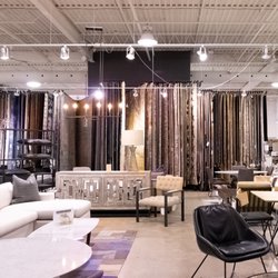 Shelter Furniture - Cozy up with our large selection of rugs. One for every need on our large rug-rack display.