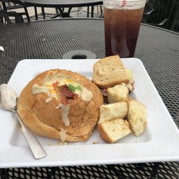 Half Rubin sandwich, bread bowl of potato soup, and a sweet tea. Half Rubin sandwich, bread bowl of potato soup, and a sweet tea.