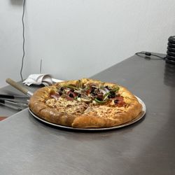 Chuck E. Cheese - They've really upgraded their menu - with stuffed crust pizza option and you can customize!