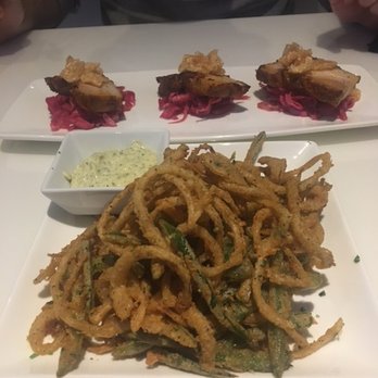 Nerdvana - Top: Honey Braised Pork Belly Bottom: Onion Jalapeño Strings - New American Near Me - Frisco, Texas