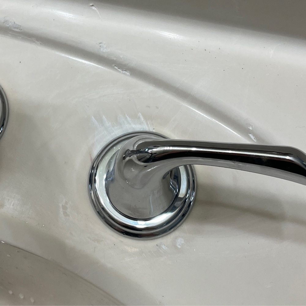 Domco Plumbing - Scratches to counter top left from "sawing off" the faucet - Plumbing Near Me - Folsom, California