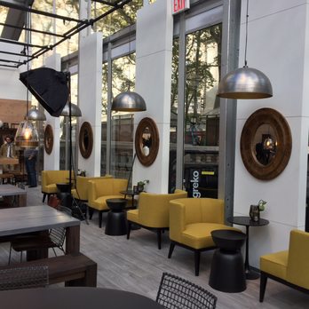 Public Fare - yellow chairs and tables in a restaurant - Wine Bars Near Me - New York, New York Public Fare - yellow chairs and tables in a restaurant - Wine Bars Near Me - New York, New York
