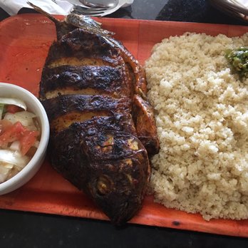 New Ivoire - A whole grilled fresh fluke fish, with the Atticka (Yuka - could be the new carb replacecment over cauliflower) - African Near Me - New York, New York New Ivoire - A whole grilled fresh fluke fish, with the Atticka (Yuka - could be the new carb replacecment over cauliflower) - African Near Me - New York, New York