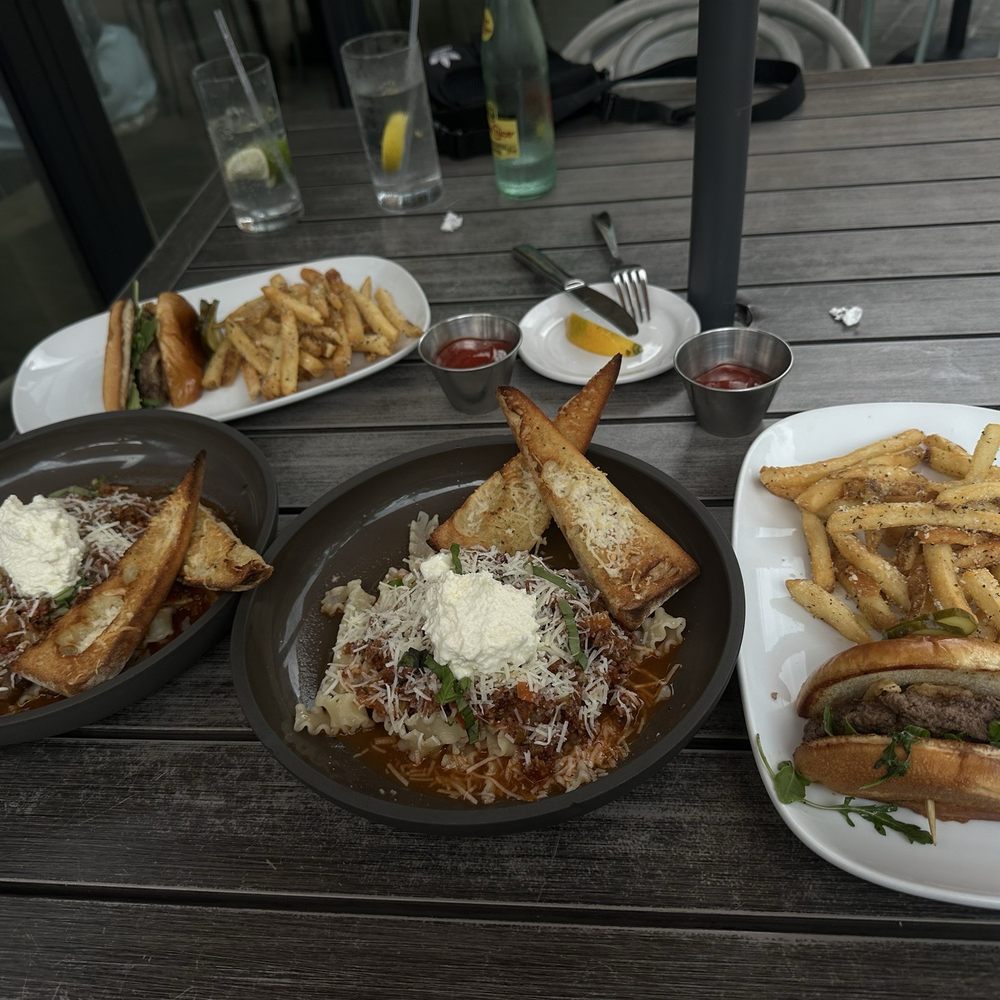 Wagyu Ragu and the wagyu grove burger split in half fuh Wagyu Ragu and the wagyu grove burger split in half fuh