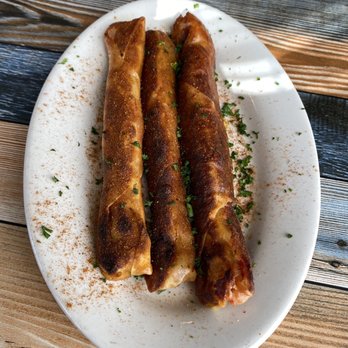 Tara Kitchen - two sausages on a plate - Moroccan Near Me - Wildwood, New Jersey Tara Kitchen - two sausages on a plate - Moroccan Near Me - Wildwood, New Jersey