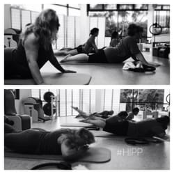 HI-Performance Pilates - Mat class performing Swan Dive Prep.
