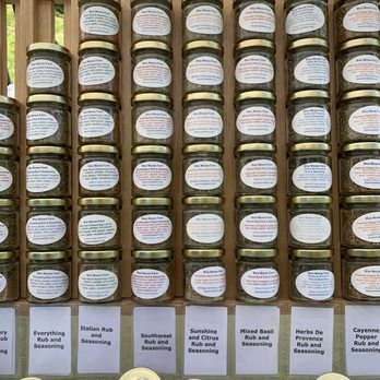 Blue Moose Farm - Stack of seasonings under the tent - Farmers Market Near Me - Roxbury, Maine