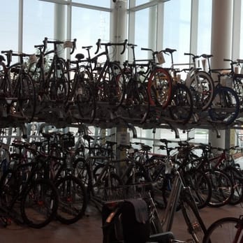 RTC Bike Center - Just one of the rows of bikes; a set of lockers (avail. to members); & an electric bike awaiting valet (avail. to all). - Bike Repair/Maintenance Near Me - Las Vegas, Nevada RTC Bike Center - Just one of the rows of bikes; a set of lockers (avail. to members); & an electric bike awaiting valet (avail. to all). - Bike Repair/Maintenance Near Me - Las Vegas, Nevada