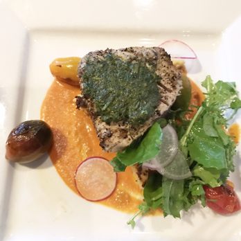 Global Grill - Any of the entrees can be split in half: pesto crusted tuna with roasted red pepper purée - New American Near Me - Pensacola, Florida Global Grill - Any of the entrees can be split in half: pesto crusted tuna with roasted red pepper purée - New American Near Me - Pensacola, Florida
