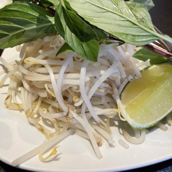 Pho4Real - a plate of noodles and a lime - Vietnamese Near Me - Henderson, Nevada Pho4Real - a plate of noodles and a lime - Vietnamese Near Me - Henderson, Nevada