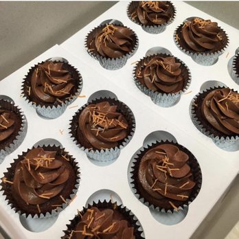 Sweet Cassandra's Cakery - chocolate cupcakes with chocolate frosting and sprinkles - Desserts Near Me Sweet Cassandra's Cakery - chocolate cupcakes with chocolate frosting and sprinkles - Desserts Near Me