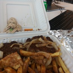 a meal in a styrofoam container