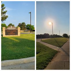 Iroquois Middle School - Walking on the sidewalk path to the entrance of Iroquois Middle School. Marquee Sign: Have A Safe, Fun Summer Students. 6/21/2024