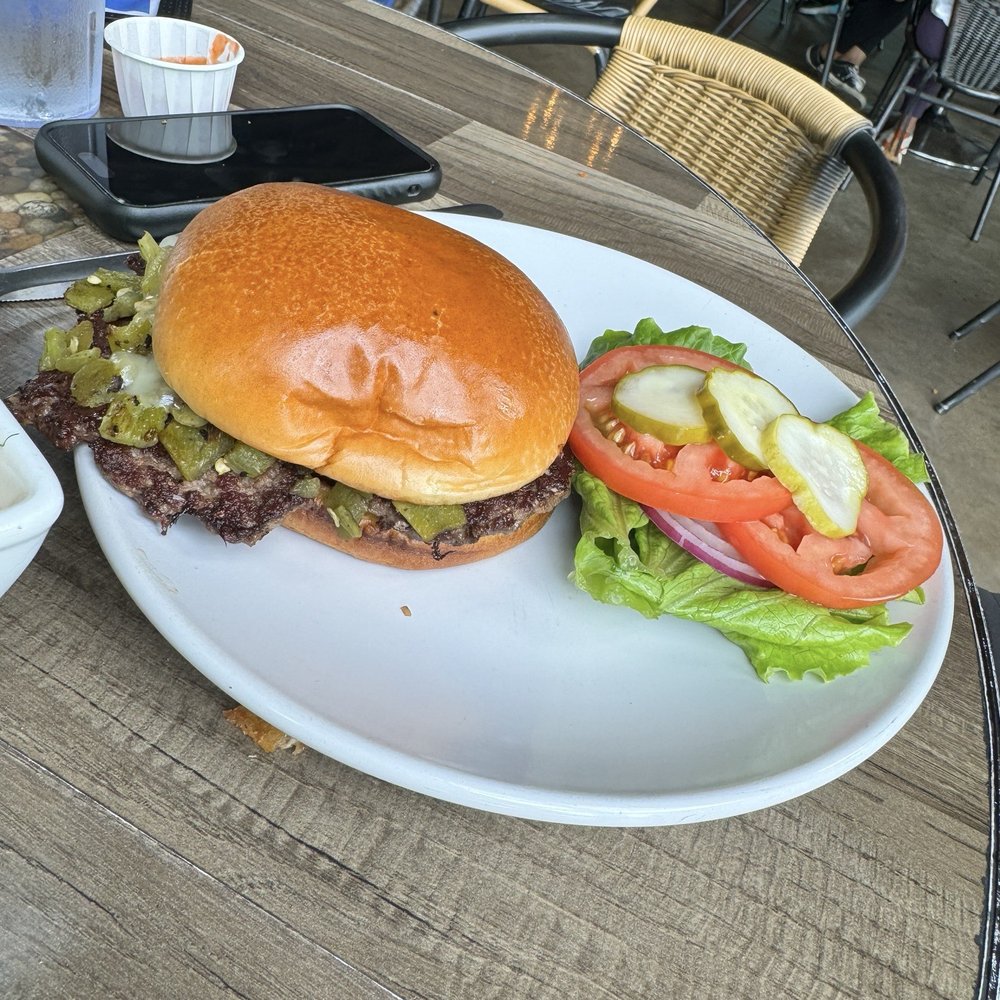 The Kosmos - Green chile cheeseburger- smash patty style - Bars Near Me - Albuquerque, New Mexico The Kosmos - Green chile cheeseburger- smash patty style - Bars Near Me - Albuquerque, New Mexico