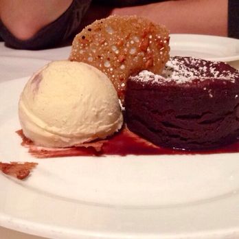 Zelo - Molten lava cake with vanilla gelato and a butterscotch crisp - Italian Near Me - Minneapolis, Minnesota Zelo - Molten lava cake with vanilla gelato and a butterscotch crisp - Italian Near Me - Minneapolis, Minnesota