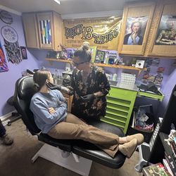 Lucky 13 Tattoo Studios - Steph mid process in the Piercing Studio