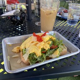 Avocado Toast dish with a cafe latte
