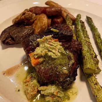 Port Land Grille - Steak and Potatoes. Lobster sauce - New American Near Me - Wilmington, North Carolina Port Land Grille - Steak and Potatoes. Lobster sauce - New American Near Me - Wilmington, North Carolina