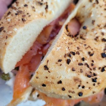 Giovanni's Brooklyn Bagels - Lox and cream cheese on an onion and garlic bagel. - Bagels Near Me - Emerald Isle, North Carolina Giovanni's Brooklyn Bagels - Lox and cream cheese on an onion and garlic bagel. - Bagels Near Me - Emerald Isle, North Carolina