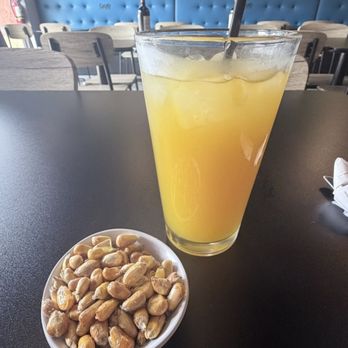 Cayjo Peruvian Cuisine - Corn nuts and passion fruit drink - Peruvian Near Me - Orlando, Florida Cayjo Peruvian Cuisine - Corn nuts and passion fruit drink - Peruvian Near Me - Orlando, Florida