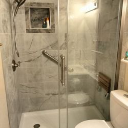 The Pro Crew - Bathroom tub to walk in shower conversion