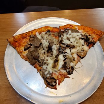 Brooklyn V's Pizza - 2 slices with mushrooms and onions. Check out that crispy crust... - Pizza Near Me - Chandler, Arizona