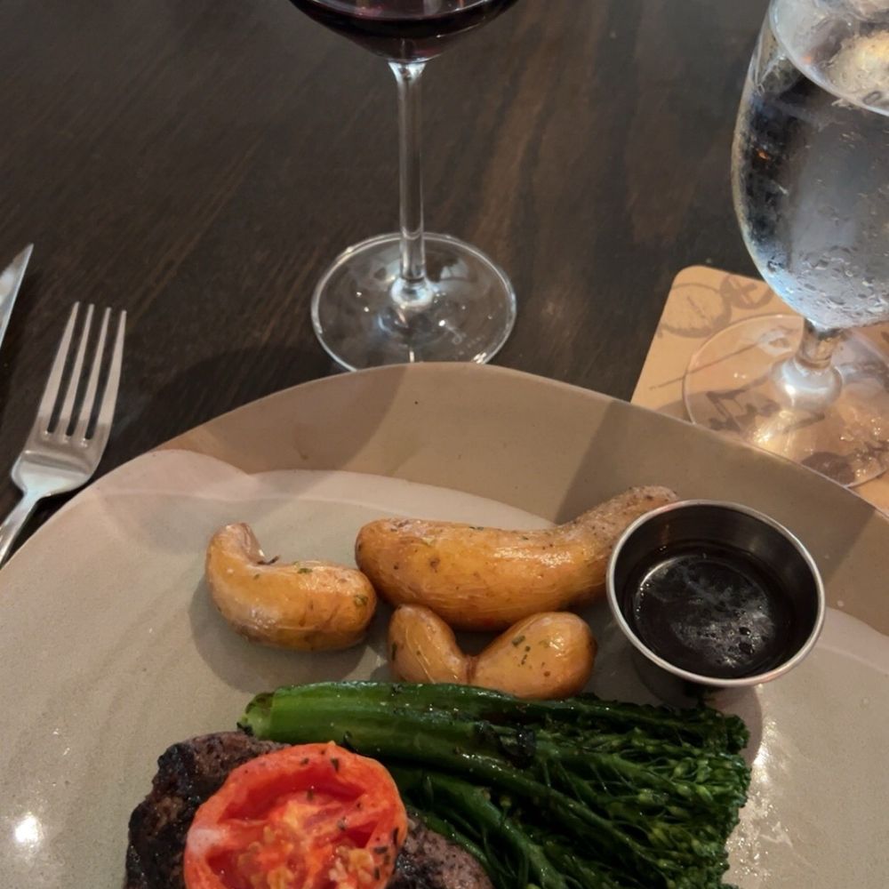 SweetFire Kitchen - filet topped with one of the best garlic roasted tomatoes I've ever had, broccolini, fingerling potatoes. too - New American Near Me - San Antonio, Texas SweetFire Kitchen - filet topped with one of the best garlic roasted tomatoes I've ever had, broccolini, fingerling potatoes. too - New American Near Me - San Antonio, Texas