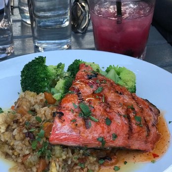 Firefly Restaurant - Sockeye Salmon $22 / glazed in sweet chili sauce / pineapple fried rice & broccoli - Tapas/Small Plates Near Me - Traverse City, Michigan