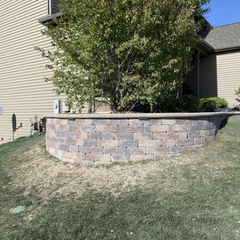 Creekside Outdoor Living - a backyard with a retaining wall - Landscaping Near Me - Crown Point, Indiana Creekside Outdoor Living - a backyard with a retaining wall - Landscaping Near Me - Crown Point, Indiana