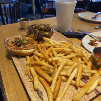 Twin Peaks - The Smokestack - Steakhouses Near Me - Live Oak, Texas
