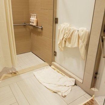The Spa at Harrah's - Shower area- these used towels were hanging there when I came in to the area. There was only 1 shower that was clean enough to use. - Day Spas Near Me - Funner, California