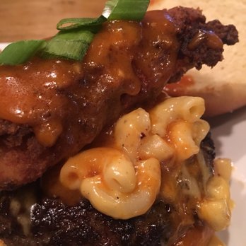 80/20 Burger Bar - Prime mEATS Bison Burger with no collar mac-n-cheese topped with a crispy chicken tender tossed in a hot, honey garlic cream. - American Near Me - Norfolk, Virginia 80/20 Burger Bar - Prime mEATS Bison Burger with no collar mac-n-cheese topped with a crispy chicken tender tossed in a hot, honey garlic cream. - American Near Me - Norfolk, Virginia