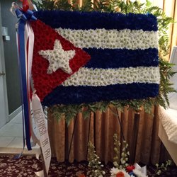 Paradise Florist - Custom flags funeral arrangement