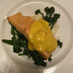 Salmon over mashed potatoes and broccoli. Delicious!